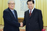 贾庆林会见韩国前总理郑元植